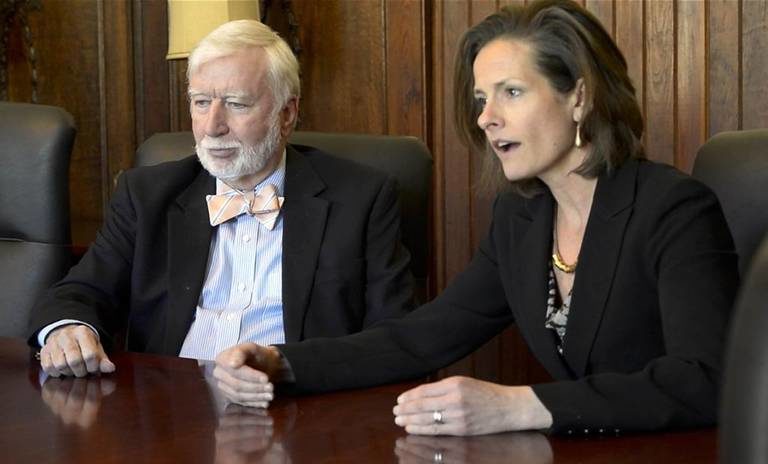 Charlotte defense attorneys Sonya Pfeiffer, right, and John Gresham