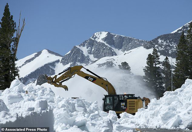 Click to enlarge Operating large machinery like this excavator on the Park's narrow roads can be extremely dangerous