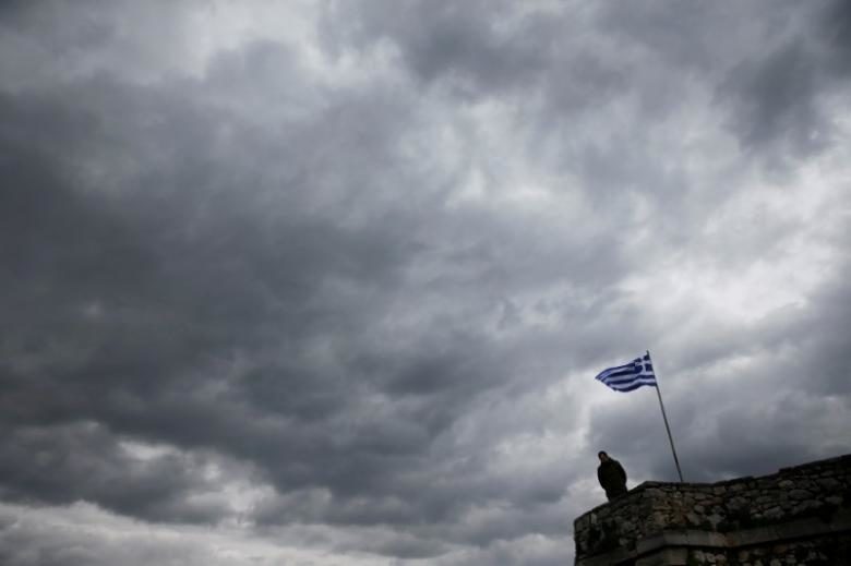Greek flag in cloudy skies