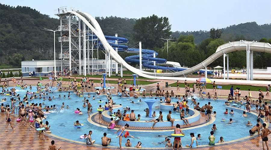 People play in a water pool at Rungna Water Park in Pyongyang