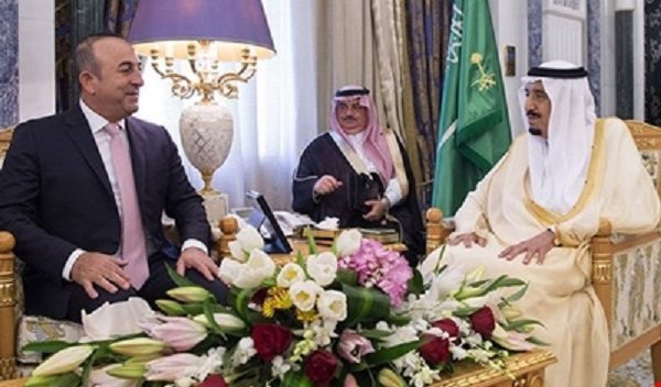 Click to enlarge Mevlut Cavusoglu and Salman bin Abdul Aziz