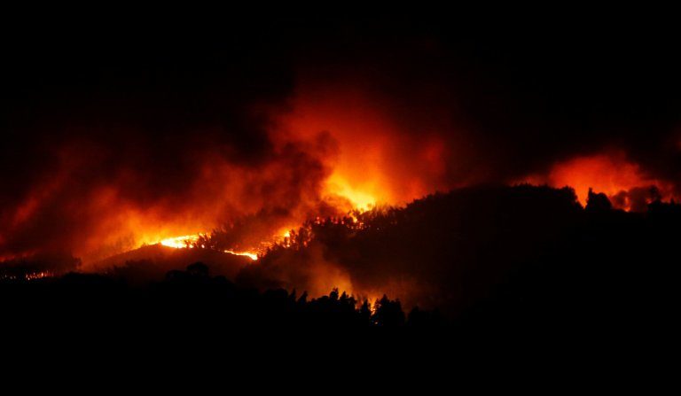 Click to enlarge A forest fire is seen near Tojeira, Pedrogao Grande