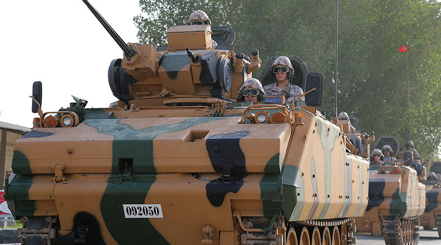 Click to enlarge Turkish APC drives at their military base in Doha, Qatar