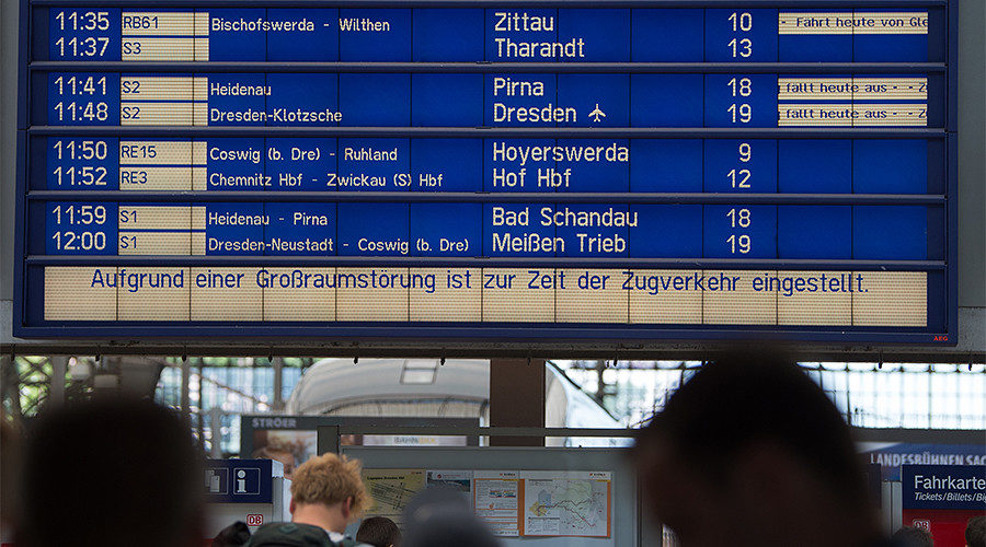 A departure board at the main train station in Dresden, eastern Germany, shows delays in traffic