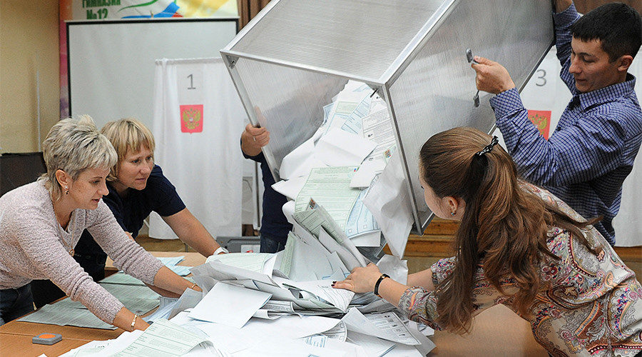 Members of an election commission during the vote count at a polling station, Russia