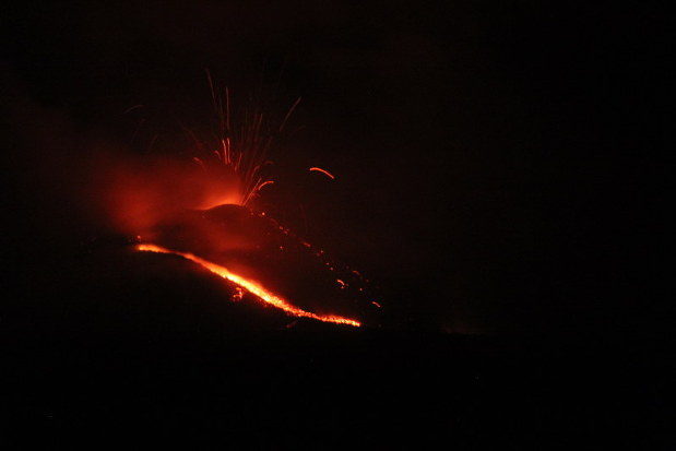 The island of Nishinoshima is seen dyed bright red by lava