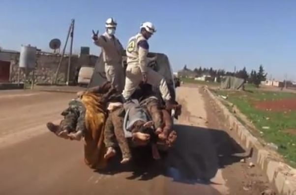 White Helmets desecrating SAA soldiers bodies
