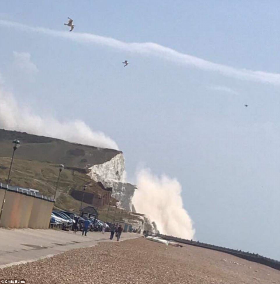 Click to enlarge A second cliff collapsed in East Sussex - just 24 hours after 50,000 tonnes of chalk and earth crashed on to the shore