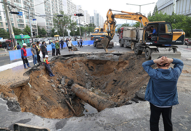 An emergency operation is under way to restore the collapsed road.