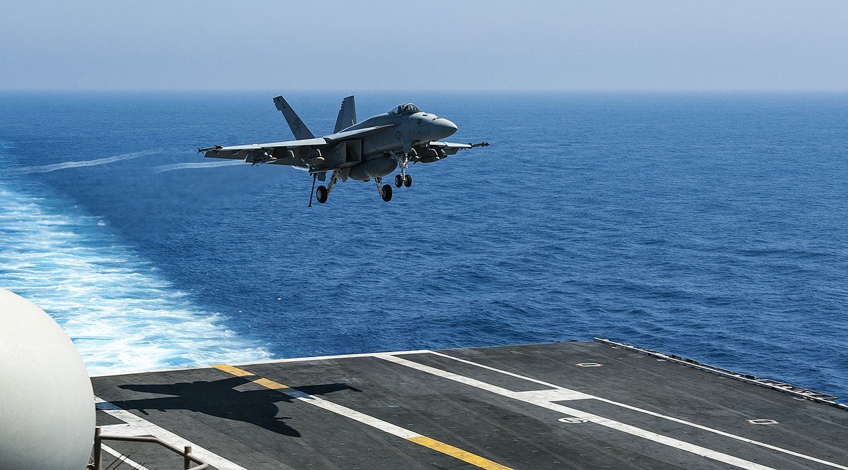 Click to enlarge US F/A-18 jet landing