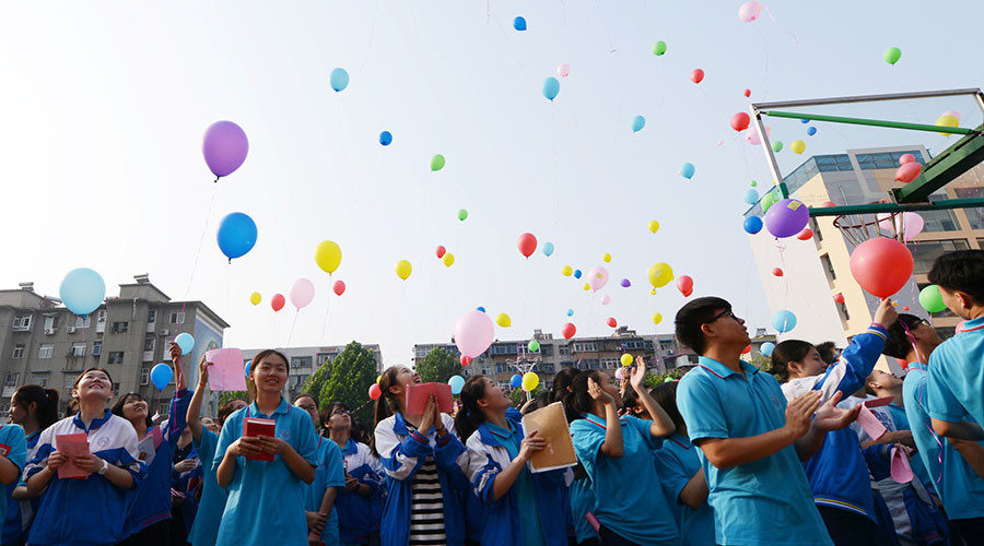 Chinese people with ballons