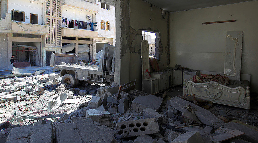 Click to enlarge damage at a site hit by airstrikes on Tuesday in the town of Khan Sheikhoun