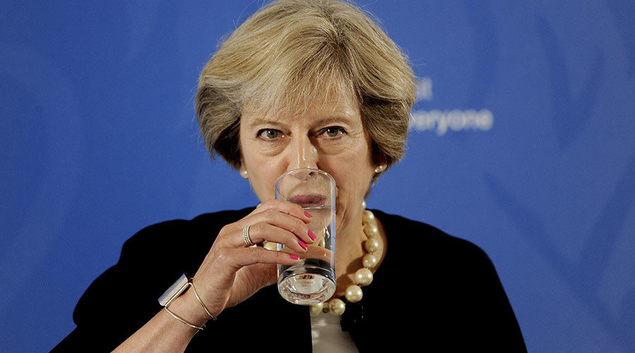 Theresa May drinking