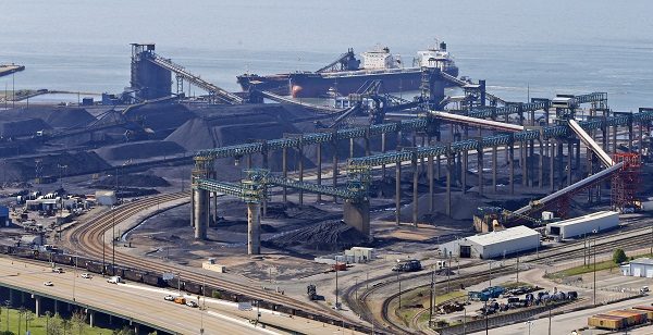 coal ship pulls up to the piers in Newport News, Va.