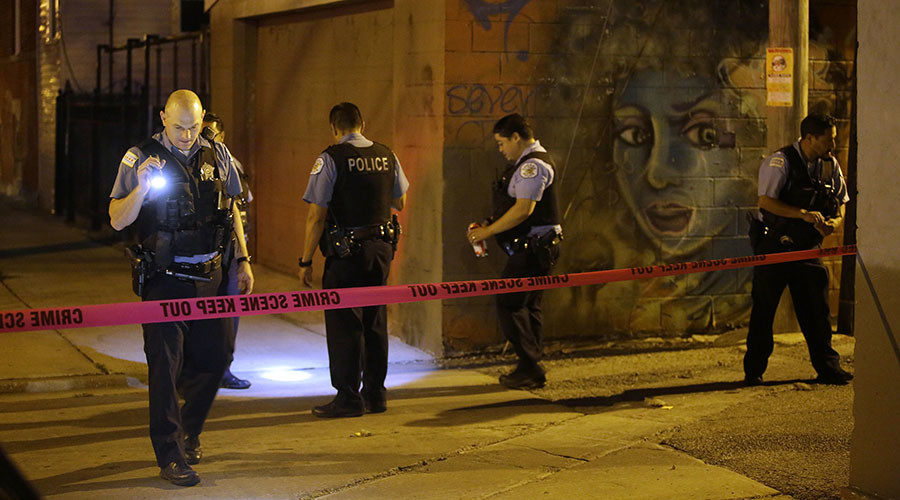 Chicago Police officers investigate crime scene