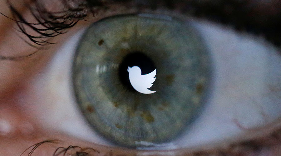 Twitter logo reflected in eye