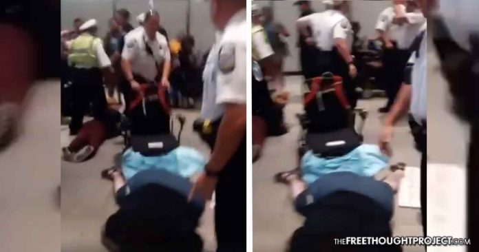 cop dumps woman wheelchair ohio protest