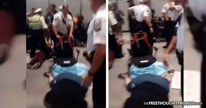 Click to enlarge cop dumps woman wheelchair ohio protest
