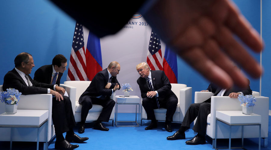 Click to enlarge Russia's President Vladimir Putin and US President Donald Trump