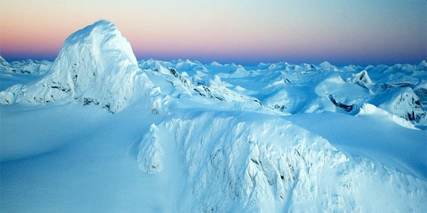 snow mountain range global warming
