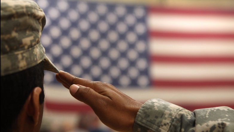 Click to enlarge US soldier American flag
