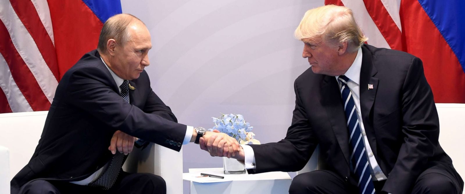 trump putin handshake