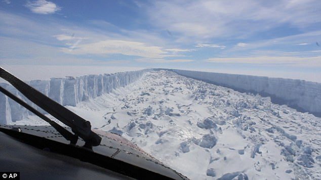 Click to enlarge In a statement, Swansea University said: 'The calving occurred sometime between Monday, July 10 and Wednesday, July 12, when a 5,800-square kilometre (2,200-square mile) section of Larsen C (ice shelf) finally broke away'