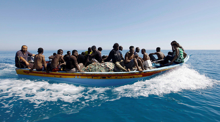 Migrants flow in a boat