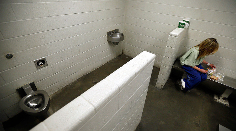 Click to enlarge woman in prison