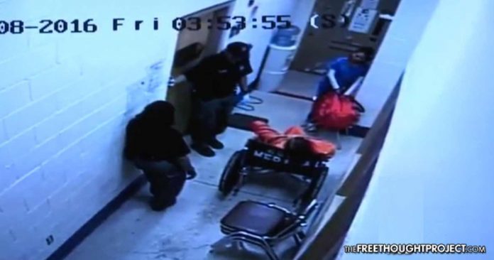 Police watch man die