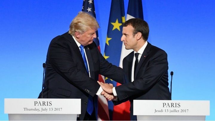 Click to enlarge trump macron handshake