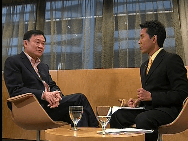 Click to enlarge Petchpradab and Thaksin Shinawatra