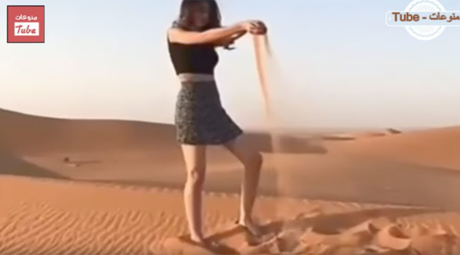 A young woman wearing miniskirt in the desert