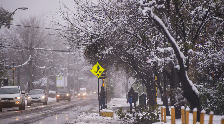 Click to enlarge View of a street covered with snow in Santiago on July 15, 2017