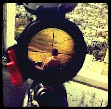 Click to enlarge Israeli sniper targetting Palestinian boy