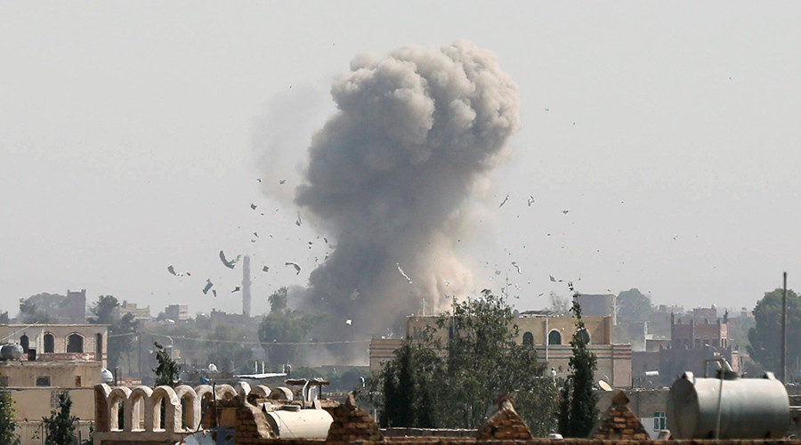 Smoke and debris rise from the site of a Saudi-led air strike in Sanaa, Yemen