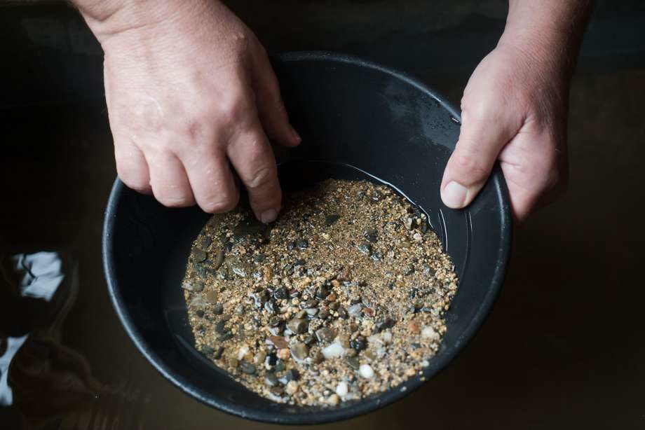 A man pans for gold
