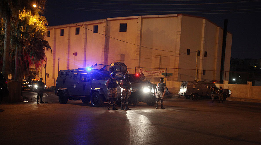 Click to enlarge Policemen are seen near the Israeli embassy in Amman, Jordan July 23, 2017
