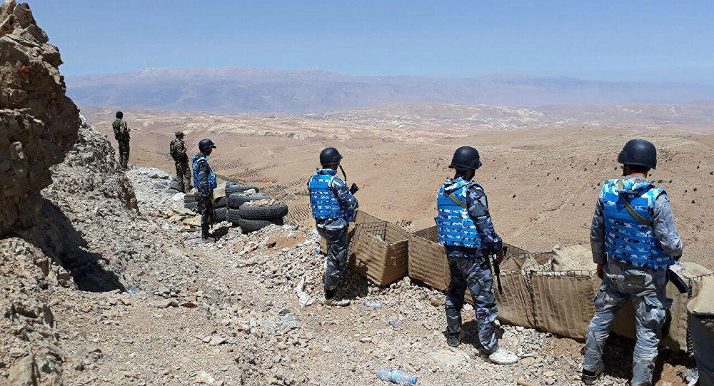 Click to enlarge Syrian and Hezbollah fighters