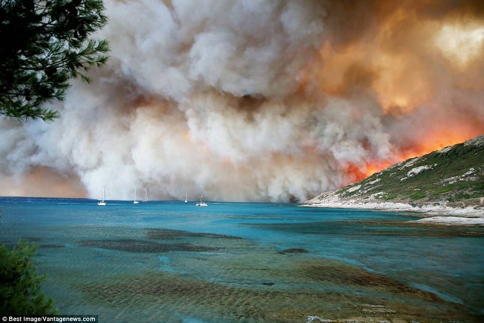 Dramatic pictures show flames and massive clouds of smoke from an inferno ripping through woodland near the upmarket French resort of Saint-Tropez. This was the scene in the hills of Gigaro in La Croix-Valmer near the glamorous town