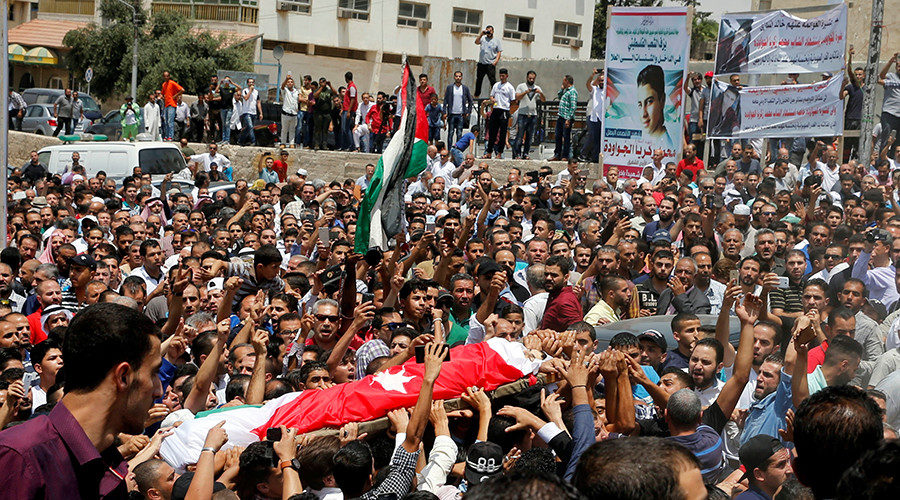 People attend the funeral of Mohammad Jawawdah in Amman
