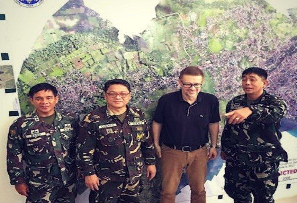 Click to enlarge Andre Vltchek with military leaders Marawi, Philippines.