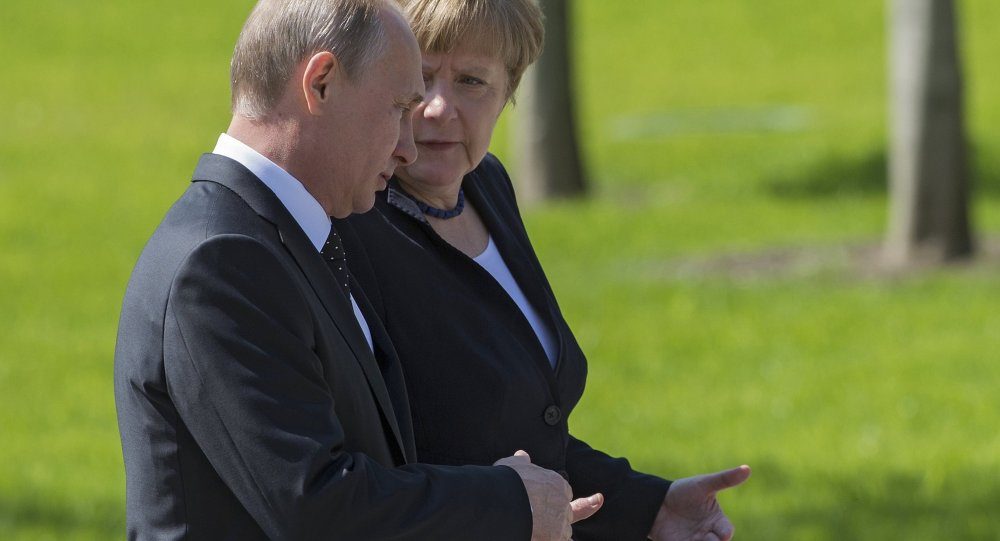 Putin Merkel