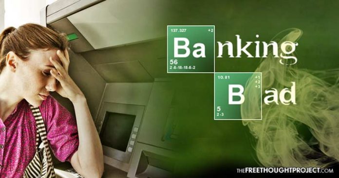 woman at banking machine