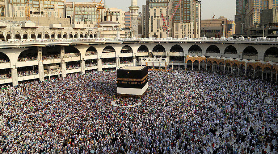Muslim pilgrims circle the Kaaba at the Grand mosque in Mecca