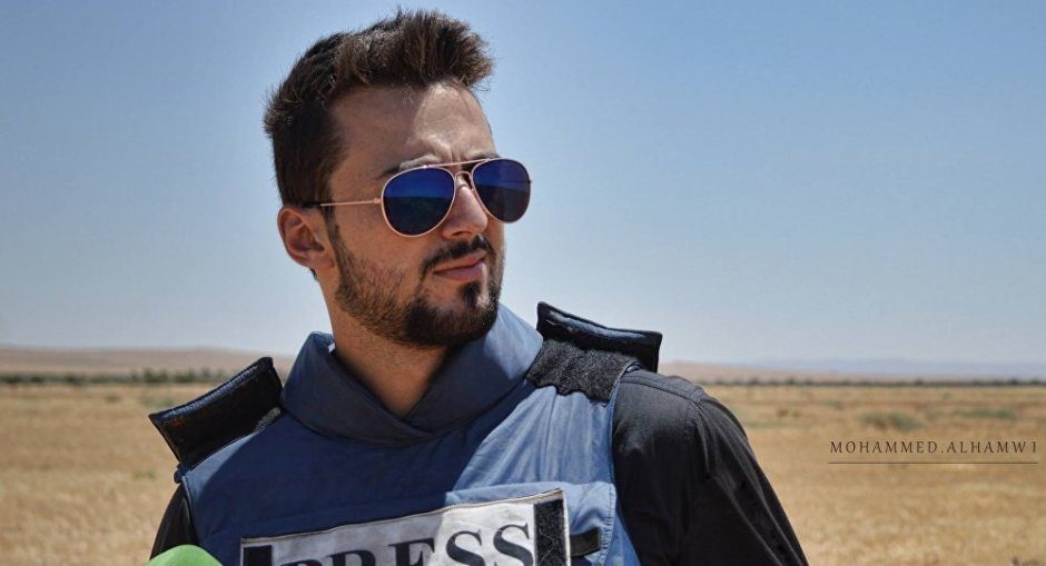 Click to enlarge Syrian journalist Khaled Al-Khateb