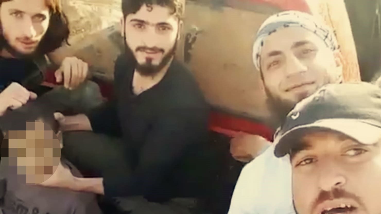 Syrian rebels behead child