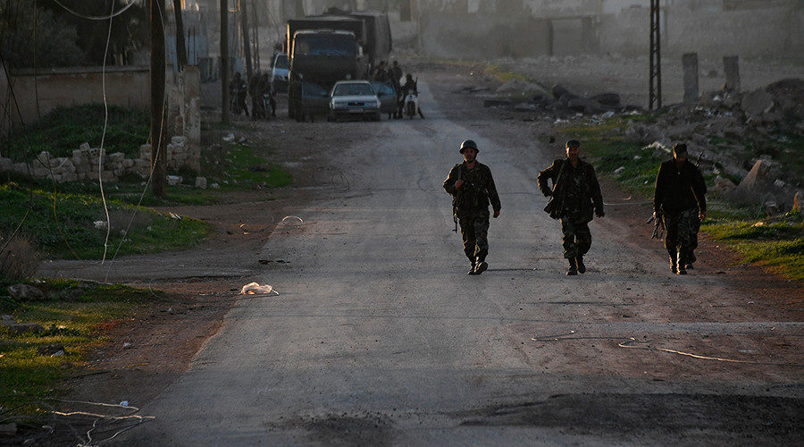Soldiers  in the village of Al-Majdal