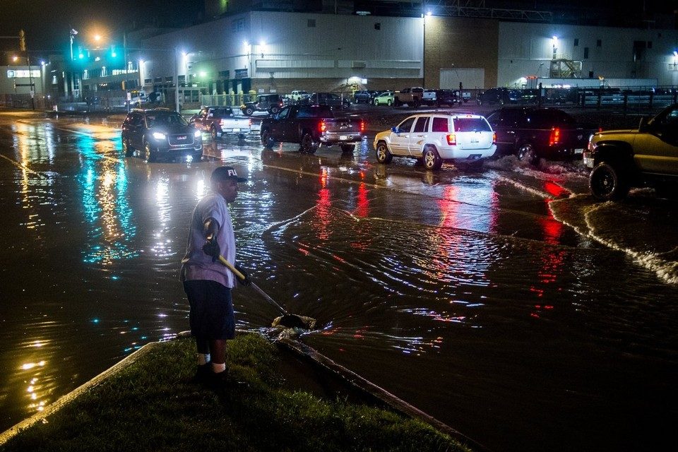 Click to enlarge Drivers ride through and deal with the repercussions of this decision at the intersection of Van Slyke and Atherton roads on Wednesday, Aug. 2, 2017 in Flint