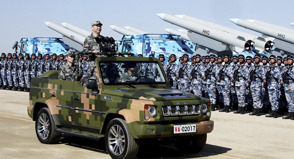 Click to enlarge Xi Jinping inspecting troops